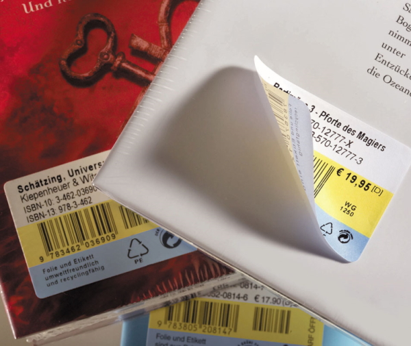 Afneembaar boeketiket op een boekrug, een hoekje losgekomen