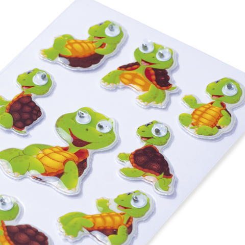 Bunte Aufkleber von Schildkröten mit beweglichen Augen, in verschiedenen Posen und Farben auf einem weißen Hintergrund.