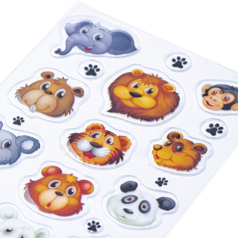 Tieraufkleber mit verschiedenen Tiermotiven, darunter ein Elefant, Löwe, Affe, Panda und andere.