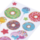 Bunte Aufkleber mit Donuts, Lollis und Sternen in verschiedenen Farben und Mustern.